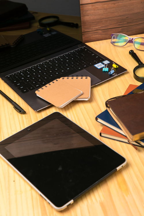 平板电脑记事本 现代商务摄影中的科技美学